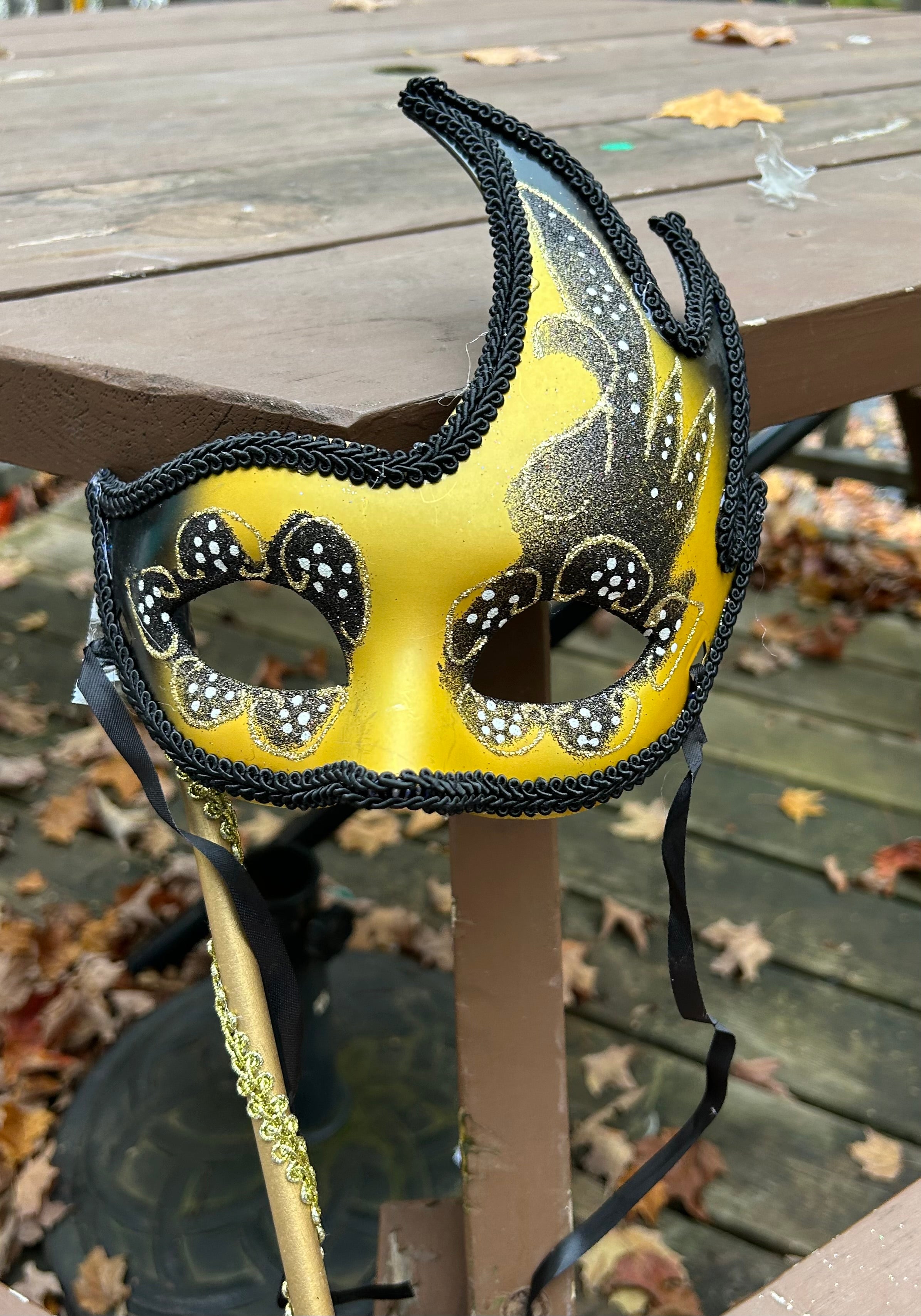 Elaborate  Face Masks on a Holder